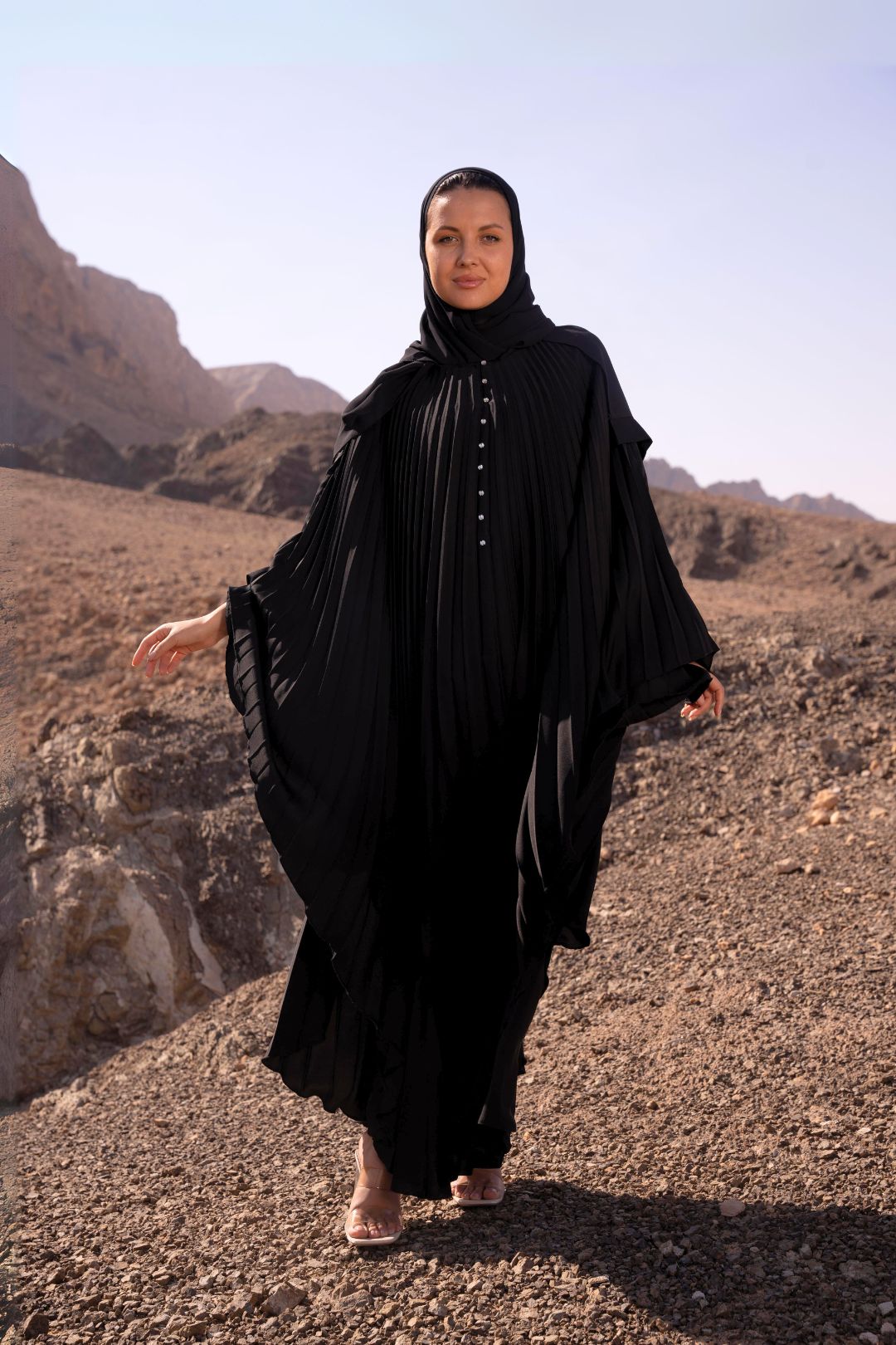 Delia Abaya in Dark Grey