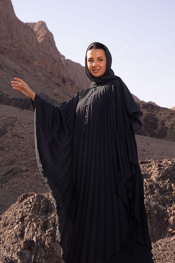 Delia Abaya in Dark Grey