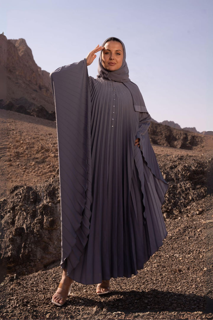 Delia Abaya in Dark Grey