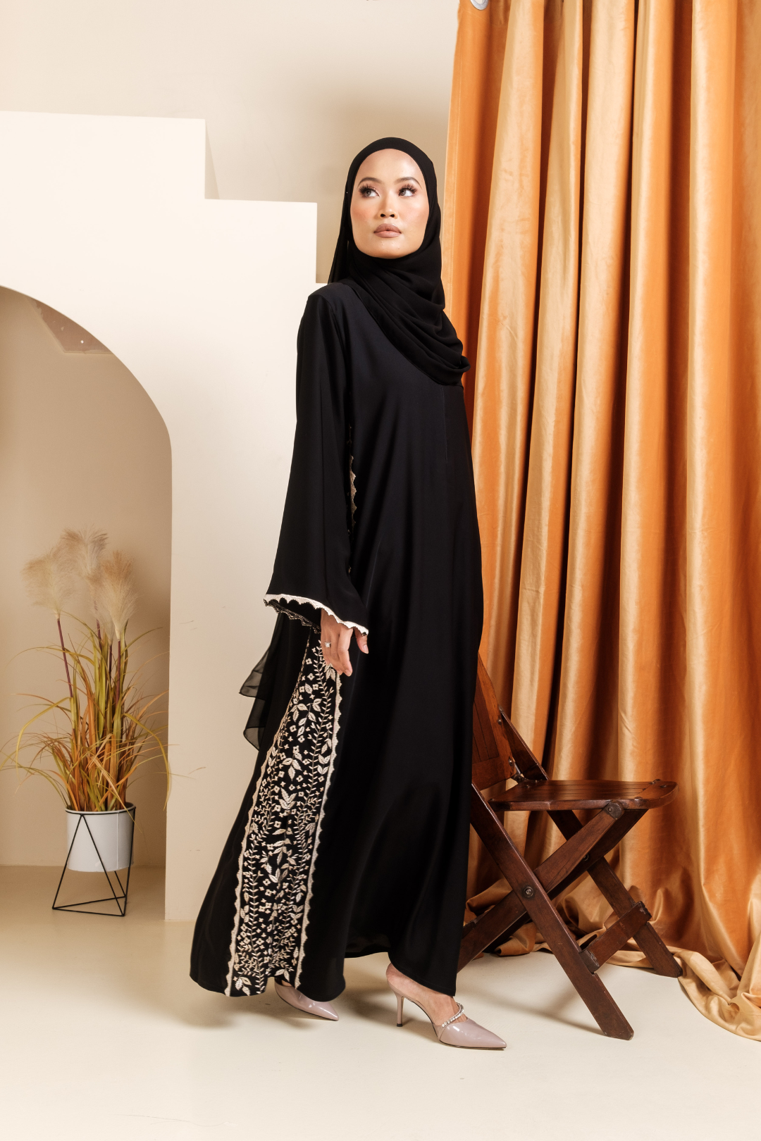 Singapore Muslimah in wearing golden floral embroidery nidha abaya with scallop trimmings